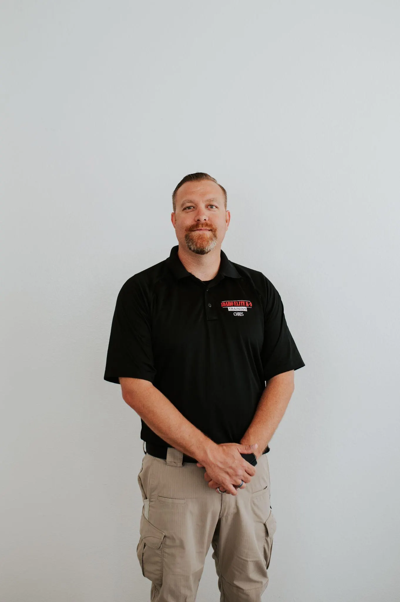Chris Norman, owner and lead trainer, working with a dog at Idaho Elite K-9